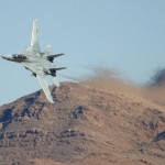 An F-14 in flight with wings extended