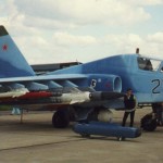 Russian Su-25TM. Carries (from tip to fuselage) R-73, R-77, 8*Vikhr, Kh-29T, Kh-58. White dome of "Kopyo" radar container is seen below, while two Omul ECM pods lie beside the aircraft.