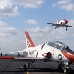 A T-45 Goshawk training aircraft is waved off from making an arrested landing aboard the aircraft carrier USS Theodore Roosevelt (US Navy photo)