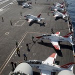 T-45 Goshawk training aircraft are staged on the flight deck of the USS Theodore Roosevelt during flight qualifications off the coast of Virginia. (US Navy photo)