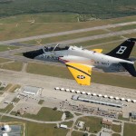 A T-45 Goshawk training aircraft painted in a pre-World War II tactical aircraft paint scheme flies over Naval Air Station Kingsville, Texas. The plane is one of nine training command aircraft being painted in celebration of the Centennial of Naval Aviation. (US Navy photo)
