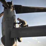 Staff Sgt. Casey Spang inspects one of the tilt-rotors on a CV-22 Osprey prior to takeoff on the flightline at Cannon Air Force Base, N.M., July 5, 2012. The 20th Special Operations Squadron conducted a routine training flight over Melrose Air Force Range, N.M. Spang is a 20th SOS flight engineer. (U.S. Air Force photo by Airman 1st Class Alexxis Pons Abascal)