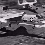 A U.S. Navy Vought F-8H Crusader of U.S. Naval Reserve fighter squadron VF-202 Superheats landing on the aircraft carrier USS John F. Kennedy during carrier qualifications in 1971 (US Navy photo)