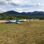 A 1965 Schweizer SGS 1-26 glider in the foreground at Franconia Airport (Air Cache Photo/John M. Guilfoil)