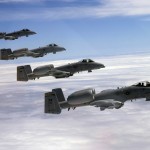Four A-10 Thunderbolt IIs from the 111th Fighter Wing of the Pennsylvania Air National Guard fly in formation during a refueling mission